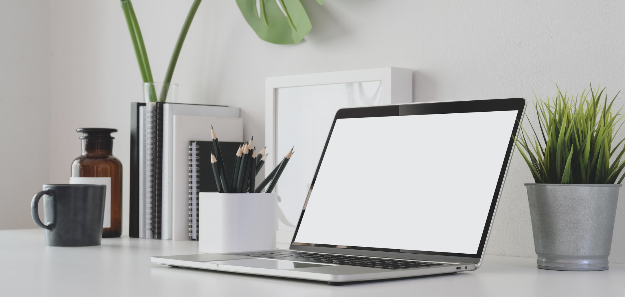 Black and Silver Laptop Computer on White Table